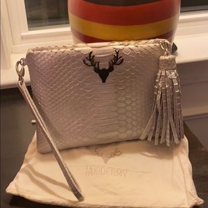 EUC Taxidermy Tassel clutch
